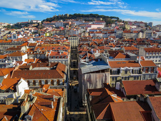 big view of the city  with in the background the hill with the famous Saint George Castle in Lisbon, Portugal