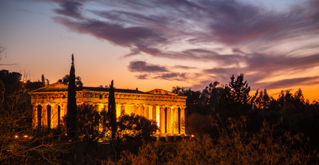 Athens Greece. Sunset time and illuminated Hephaestus temple at city center