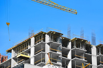 Crane and highrise construction site