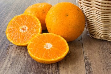 Close up, orange slices on wood table
