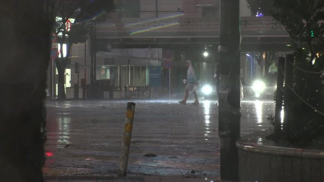 TOKYO,JAPAN - 12 OCTOBER 2019 : Powerful Typhoon Hagibis made landfall. Heaviest rain and winds in 60 years. Government issued highest level of disaster warning. View around Shibuya scramble crossing.