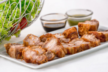 Crispy Pork Belly with white background.