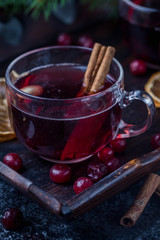 Mulled wine with spices, oranges and cranberries
