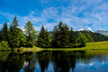 Fototapeta na wymiar A small lake in Switzerland