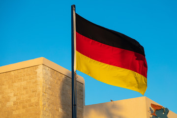 German flag on sky background