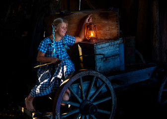 the girl is frolicking and flashing headlights in the fall