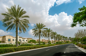 Luxury villa compound housing development with beautiful blue sky with white clouds