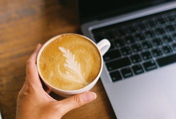 cup of coffee and laptop