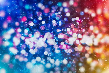 glittering shine bulbs lights background:blur of Christmas wallpaper decorations concept.holiday...