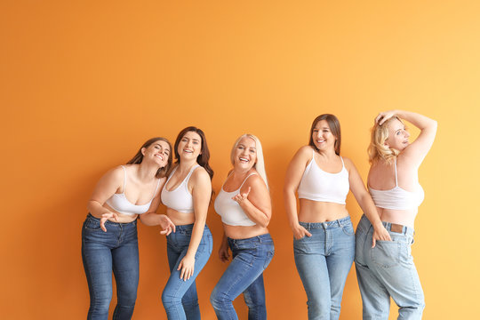 Group of body positive women on color background