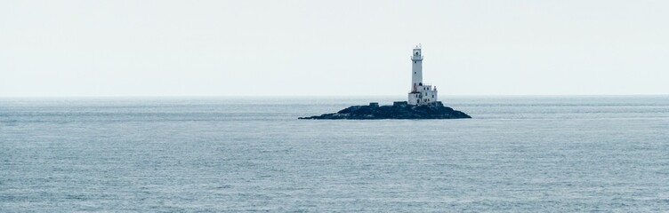 Fototapeta premium Panorama Lighthouse on Island Rosslare Leuchtturm auf Insel