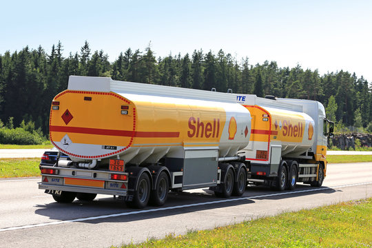 Shell Fuel Truck Hauls Fuel Along Freeway. Illustrative Editorial content.