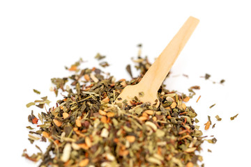 Heap of floral loose leaf herbal tea isolated on a white background