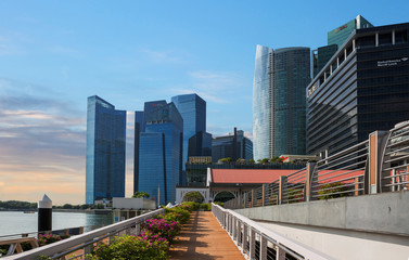 Fototapeta na wymiar Singapore, Waterfront. Business center. Buildings in the Central business part of the city are offices of major companies, banks, interspersed with boulevards and squares.
