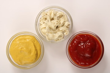 Mustard, tartar sauce and ketchup