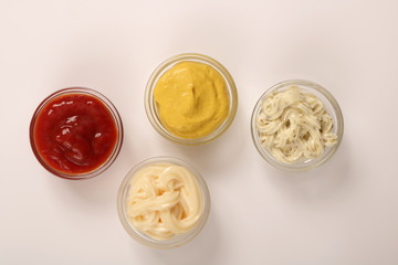 ketchup, mustard, mayonnaise and tartar sauce