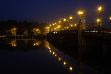 Fototapeta na wymiar Donetsk evening landscape. Illicha street bridge.
