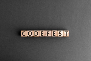 Codefest - word from wooden blocks with letters, hackathon a hack day, hackfest or codefest...