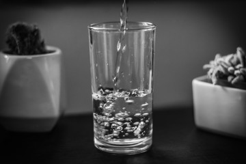 glass of water on black background