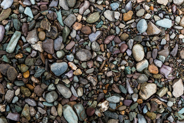 The texture of a shallow river stone. Pebble Background Image