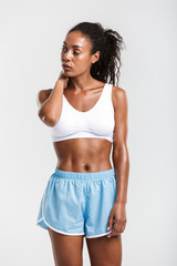 Fototapeta premium Full length of an attractive healthy african sportswoman