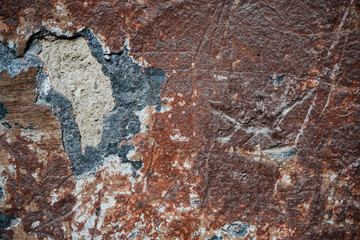 Texture of an old wall covered with paint. Background image of a worn paint coated surface