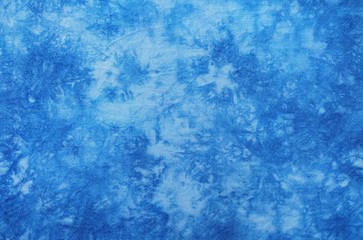 Background of dyed fabric. Beautiful abstract background. Sky, sea, blue background