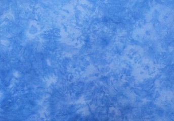 Background of dyed fabric. Beautiful abstract background. Sky, sea, blue background