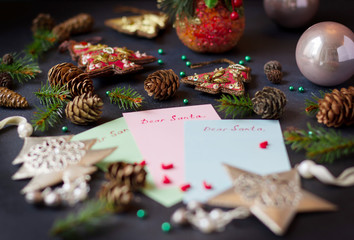 Naklejka na ściany i meble Christmas composition. Letters to Santa with Christmas and New Year decoration. Xmas card