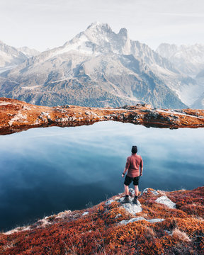 Amazing view on Monte Bianco mountains range with tourist on a foreground. Lac de Cheserys lake, Chamonix, Graian Alps. Landscape photography
