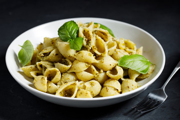 Conchiglie pasta with pesto sauce