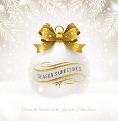 Christmas white bauble with glitter gold bow ribbon and greetings. Christmas ball on a snow. Vector illustration.