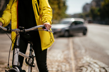 Close up of female person riding bicycle