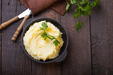Fresh homemade creamy mashed potato in bowl (Selective Focus, Focus one third into the potato puree)