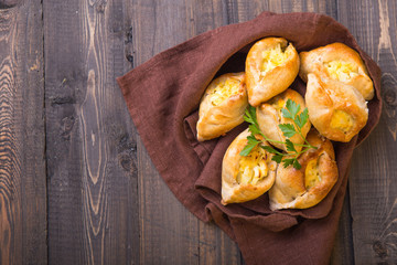 Rasstegai pie with fish filling and rice , egg. Traditional meal of Russian cuisine.