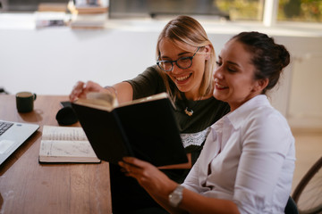 Businesswomen discussing work in the office 