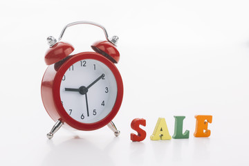 Red clock with sale concept