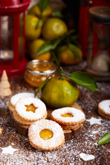 Linzer Christmas cookies with tangerine jam and sugar powder. Delicious biscuits. Sweet dessert