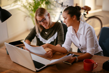 Businesswomen doing paperwork in the office