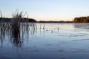 Frozen lake in sunset