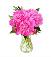 Bouquet of pink peony flowers in glass vase