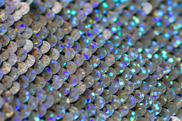 Silver sequin fabric close up