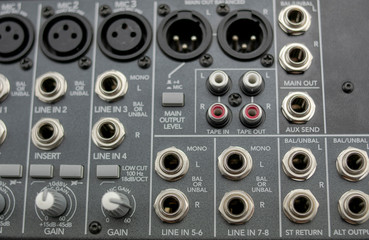 Inputs and outputs of an analog audio mixer with eight channels