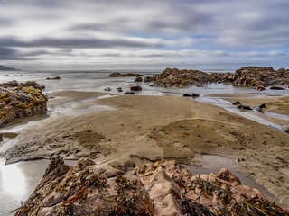Moody beach landscape long exposure