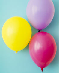 Colourful balloons on blue background