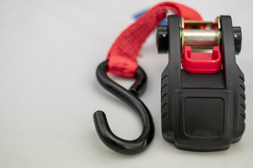 Close-up of ratchet strap and holding hook