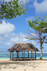 Beach fale, a simple open 'hut' (faleo'o Samoan language), popular in budget eco-tourism in Samoa. Beautiful day fale at Upolu island © peacefoo