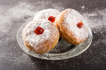 Hanukkah sufganiyot. Traditional Jewish donuts for Hanukkah. 