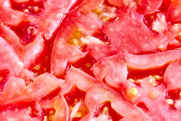 Tomato slices. Natural background with slices of tomato