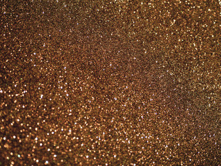 Fototapeta na wymiar Top view brown glitter background
